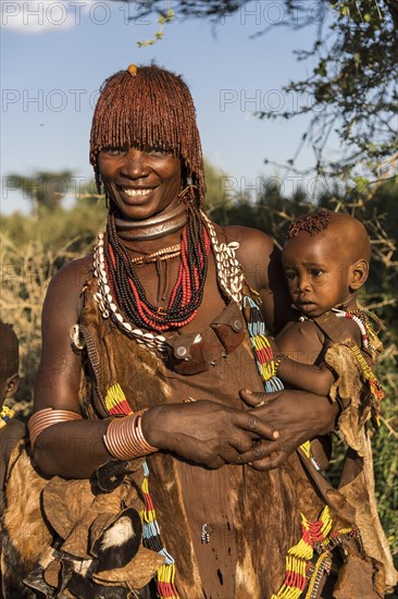 Woman with an infant in her arms