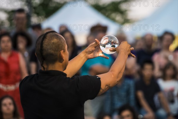 Juggler with crystal ball