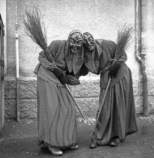 Witches with broom in hand