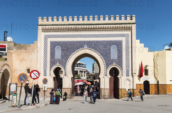 Locals and tourists in front of Bab Boujeloud