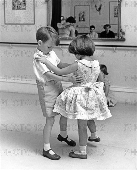 Two children dancing