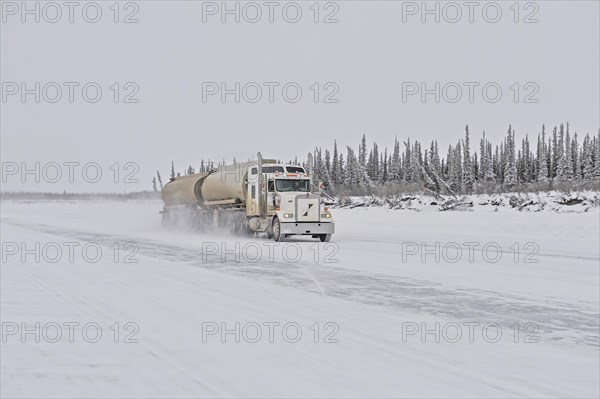 Cleared ice road with truck