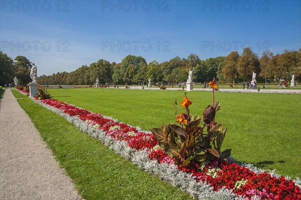 Park with flowerbeds and statues