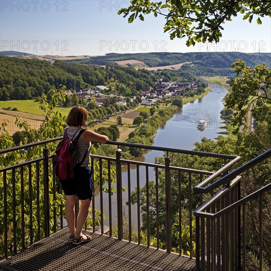 Woman looks from the Skywalk on the Weser