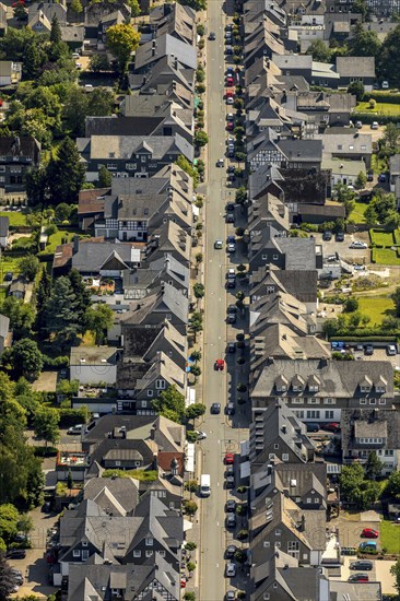 Rows of houses next to the street through the city centre