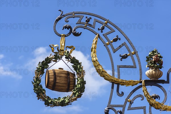 Hanging shop sign with a beer barrel