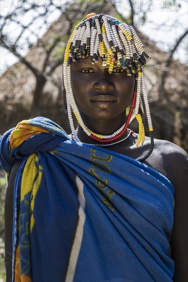 Young woman with headdress