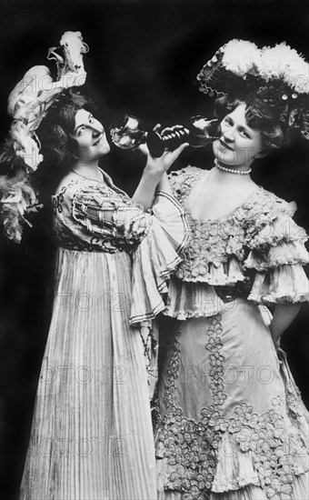 Two women drinking wine