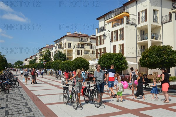 Tourists on the beach promenade