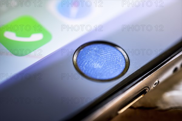 Close-up of Home button of the iPhone 6s with fingerprint on fingerprint sensor