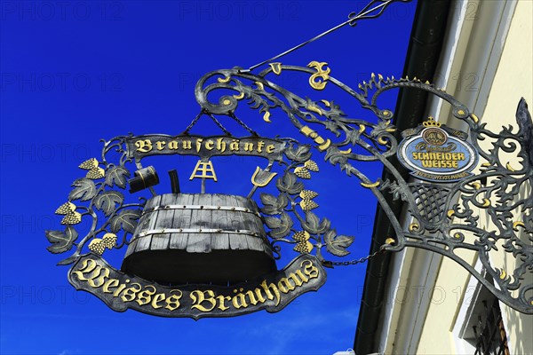 Hanging shop sign wheat beer brewery Schneider