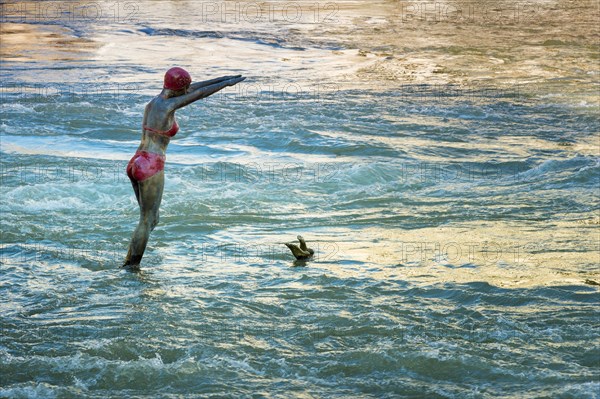 Woman Statue diving in the Vardar river
