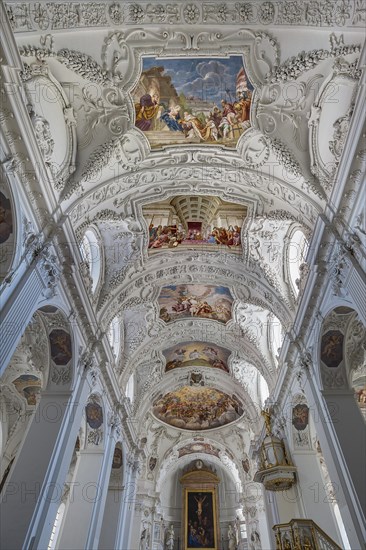 Interior view with chancel and ceiling frescoes and stucco