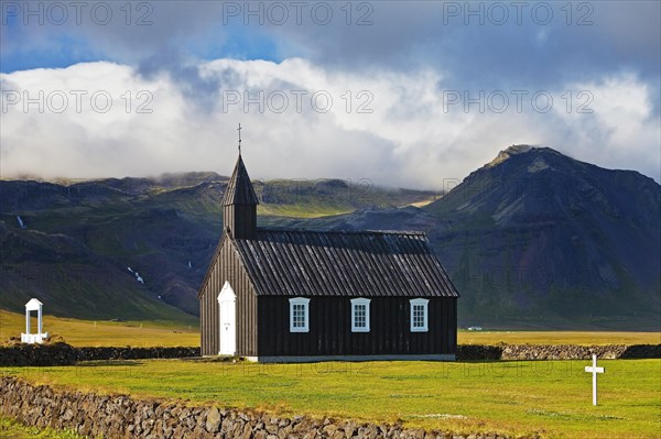 Black wooden church off Bergen