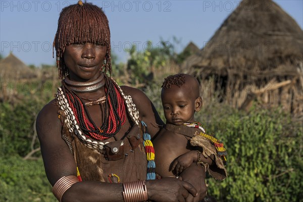 Woman with an infant in her arms