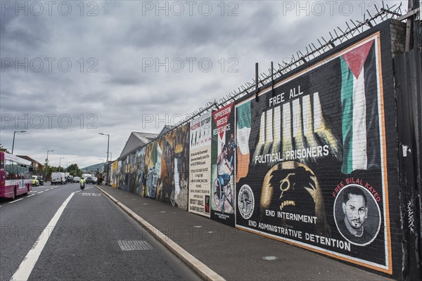 Political graffiti on wall in West Belfast reminiscent of the civil war between Protestants and Catholics