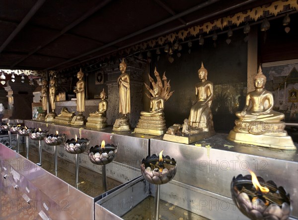 Golden Buddha statues in the temple Wat Phra That Doi Suthep