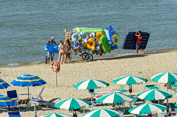 Vendor with beach toys at the beach