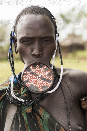 Woman with lip plate