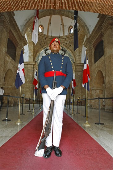 Man in uniform with rifle or guard at the entrance to the National Pantheon