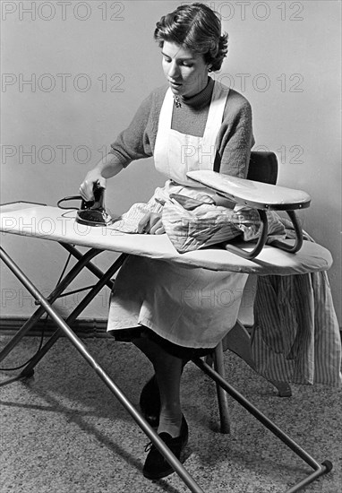 Housewife ironing