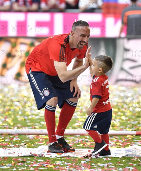 Soccer player Franck Ribery FC Bayern Munich claps off with son Salif