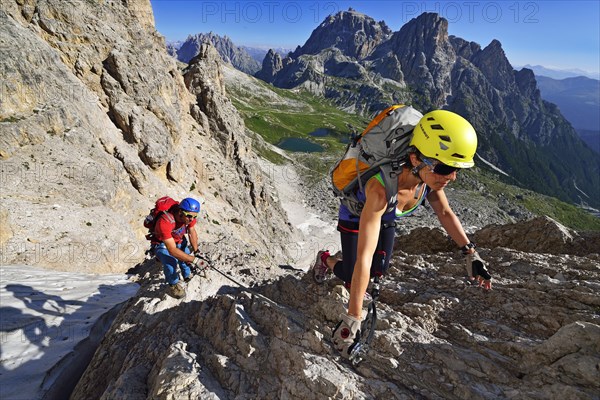 Climbers climbing the Paternkofel