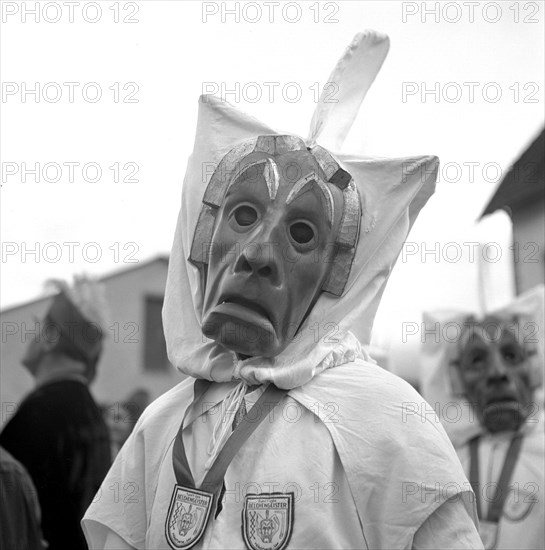 Man with sad looking mask