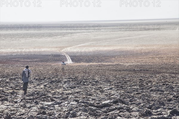 Worker in the salt desert at the edge of the Danakil Valley