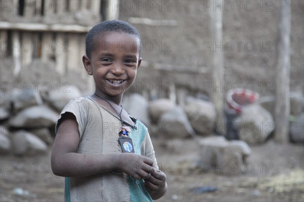 Portrait of a boy in a village