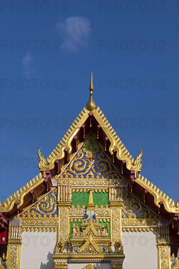 Pediment of the Bot in front of the Chedi of Wat Phra That Phanom