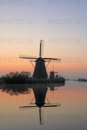 Historical windmills at dawn