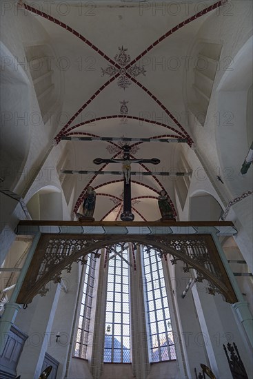 Christ Cross under the Gothic vault of the St. Jakob and St. Dionysius Church