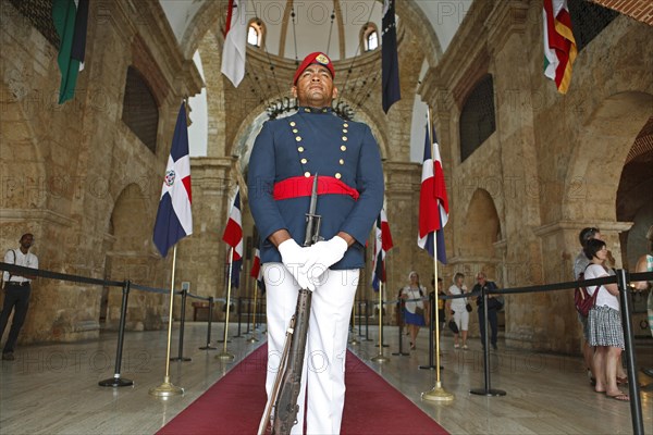 Man in uniform with rifle or guard at the entrance to the National Pantheon