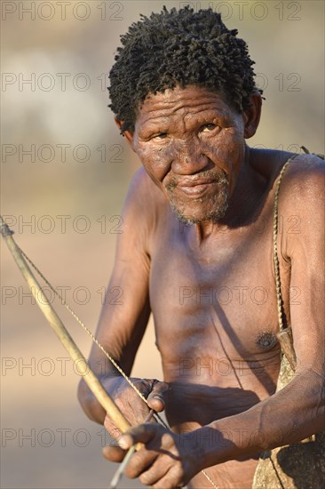 San man with bow and arrow