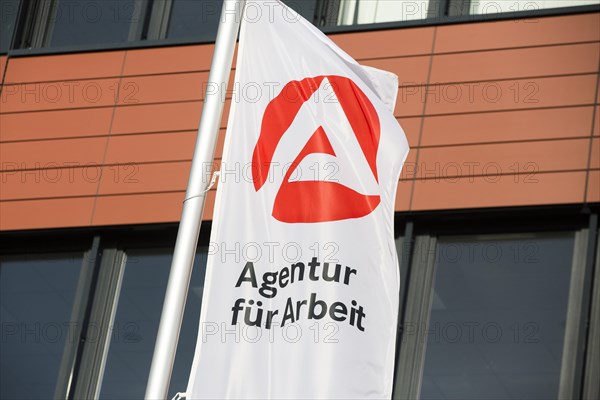 Flag in front of the new building of the Employment Agency