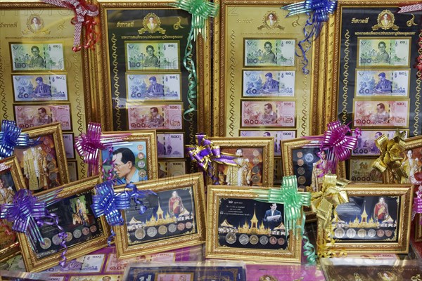 Former King Bhumibol Adulyadej on banknotes and coins