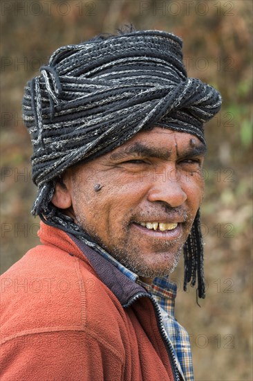 Nepalese man wearing a scarf