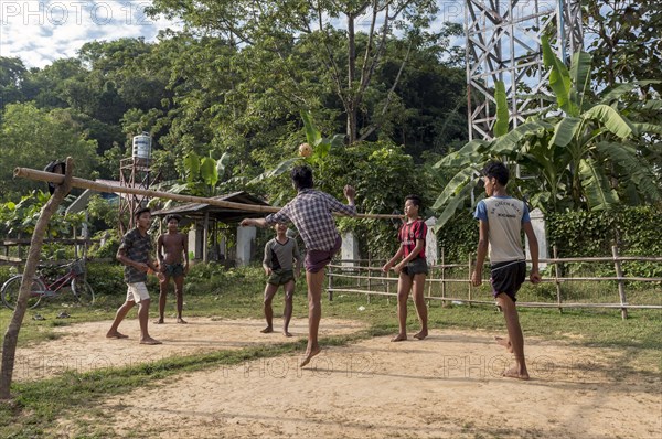 Villagers play a game of Sepak Takraw in Mrauk U