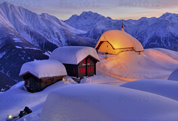 Chapel Maria in the snow with deep snow in the village centre