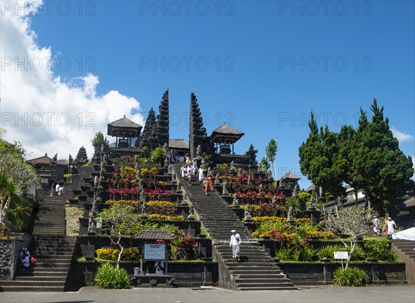 Devout Balinese descend stairs