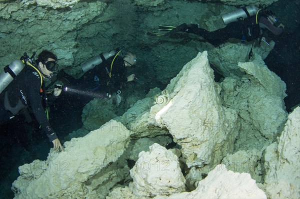 Divers in the Cenote Tajma Ha