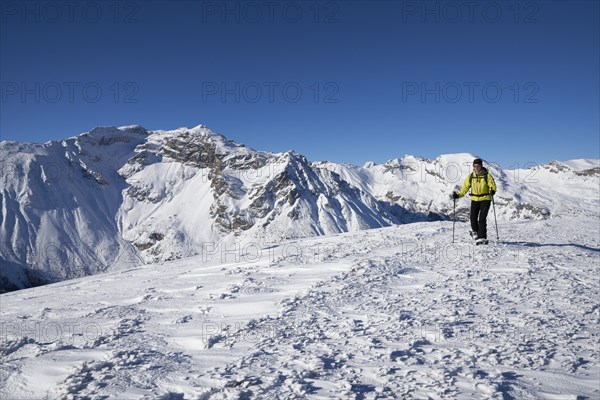 Obernberger Tribulaun in winter with snowshoe hiker