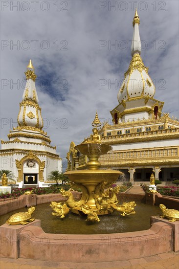 Gilded fountain in front of the 101m high Phra Maha Chedi Chai Mongkhon Pagoda