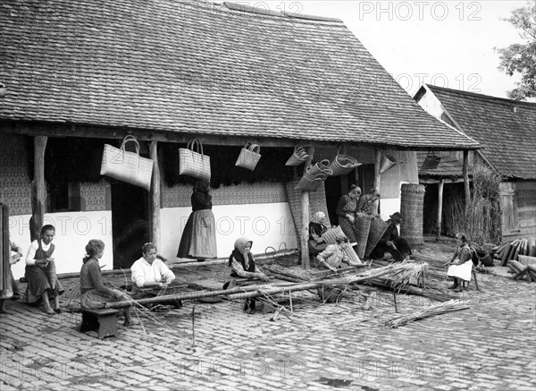 Women weave bags c. 1930