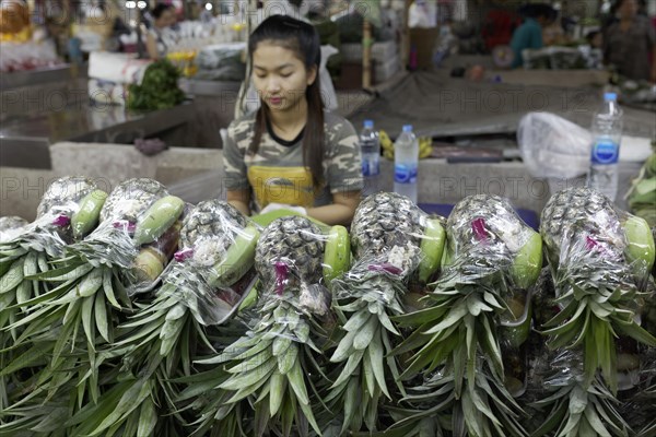 Pineapples and bananas for sale