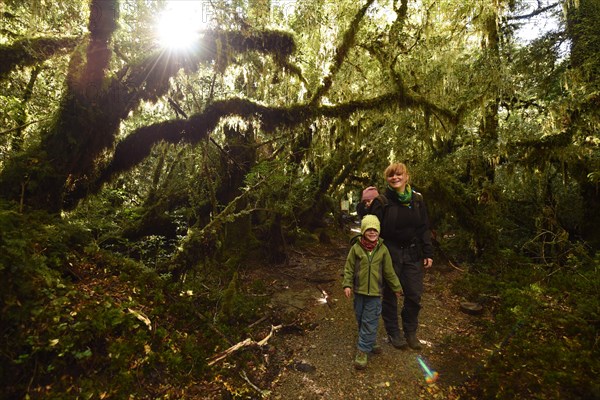 Mother with child hiking in El Bosque Encantado