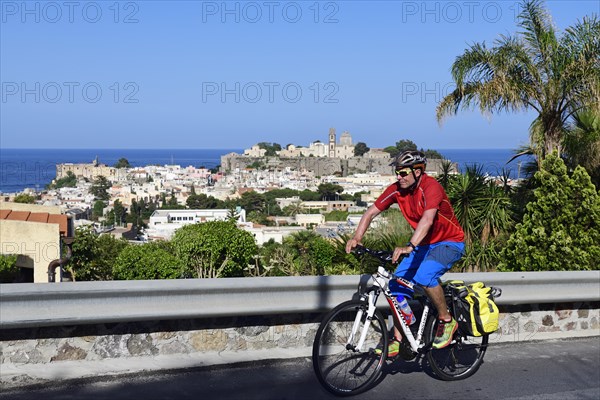 Cyclist above Lipari city