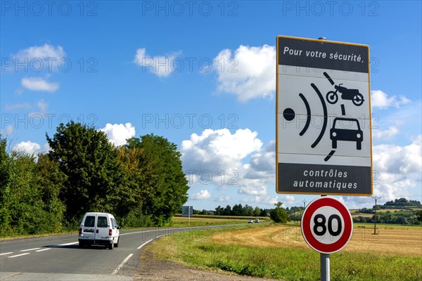 Sign of speed limit reduced to 80 km/hour and radar speed check