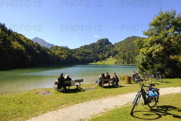 Cyclists take a break at the Alatsee
